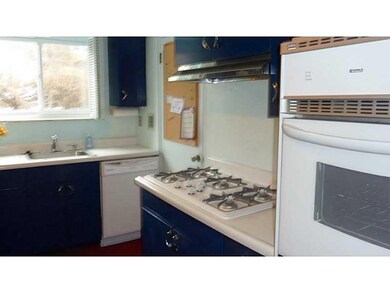 Kitchen. The new dishwasher and cooktop will remai