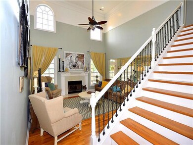 As you enter the home, you'll see the 22 foot ceilings and a large open living room