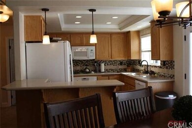 Bright and cheery kitchen, corian countertops