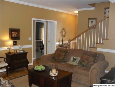 Family room showing staircase to upper level