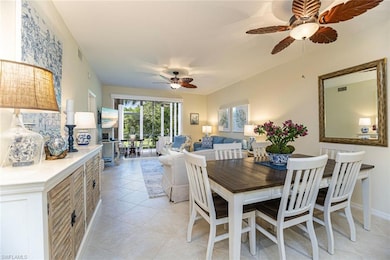Dining space with light tile patterned floors and 