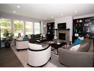 Family Room. Home is under construction.  Photo is of a similar model.