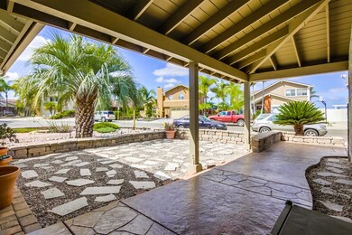 Large, Covered Entry with Stamped Concrete, Could 