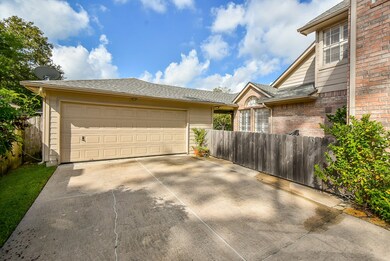 Extended driveway with private backyard.