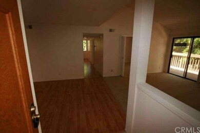 LOOKING IN FRONT DOOR