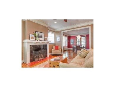 Living Room With Fireplace View to Dining Room