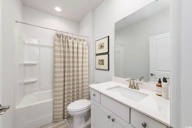 Full bathroom featuring tile patterned floors, van