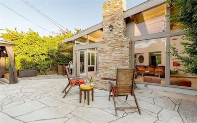 Step out to the stone patio with fire pit, gazebo 