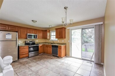 104 W Calico Dr, Raymore, MO 64083 - photo 6