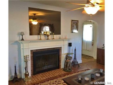 Living Room. Wood burning fireplace with brick sur