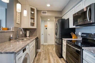 Updated kitchen with black stainless appliances