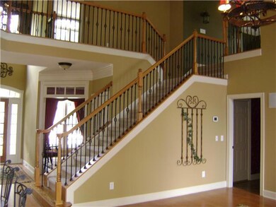 This view shows the catwalk and volume in the great room, wow!( Picture is for representation only.)