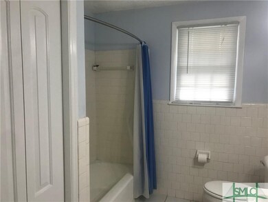 Bathroom is light and bright.