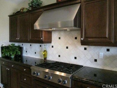 DARK ELEGANT CABINETRY, FULL BACKSPLASH, UPGRADED 