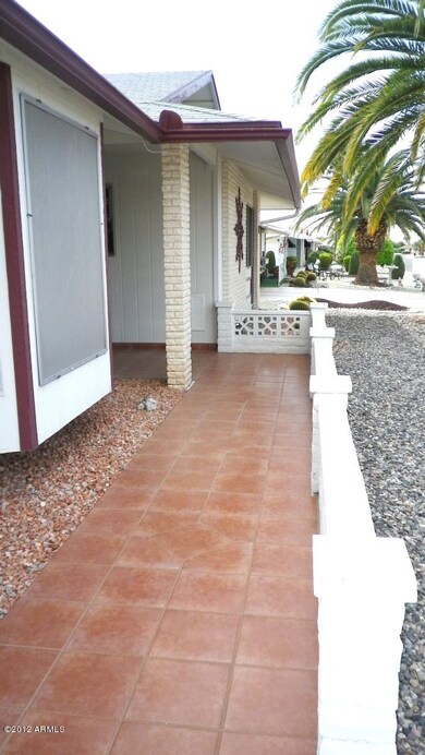 Tiled walkway to door