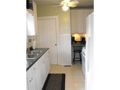 Kitchen. Loads of Cabinets & Breakfast Bar area.