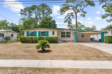 7041 Holiday Rd N, Jacksonville, FL 32216 - photo 2