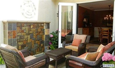 Courtyard patio off formal dining room with founta