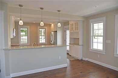 Open concept kitchen with stainless steel package,
