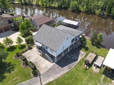 Another view of home with Calcasieu River in back 