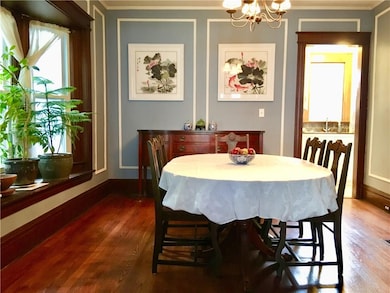 The formal dining room with beautiful bay window w