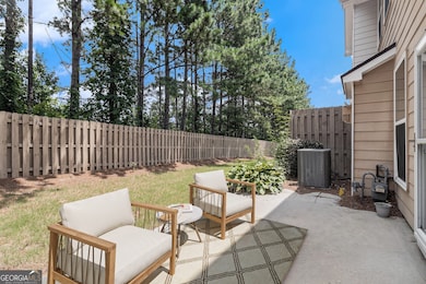 Step outside to enjoy a Private Walk-Out Patio and Grassy Yard ideal for Pets, a Garden, or Weekend Grilling.