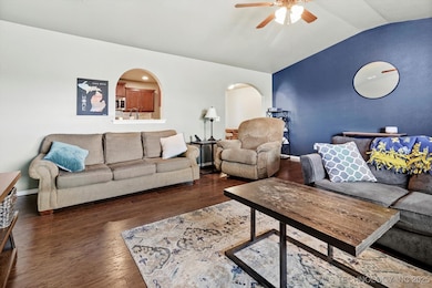 Spacious living room with kitchen pass-through