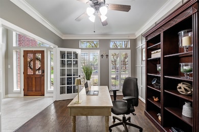 The study features French doors for privacy and qu