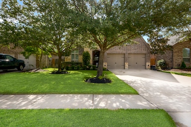 Upgraded Exterior elevation of brick and stone. Home is located on a  Cul-de-sac Street.