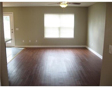 Living Room. Spacious foyer opens to living room.