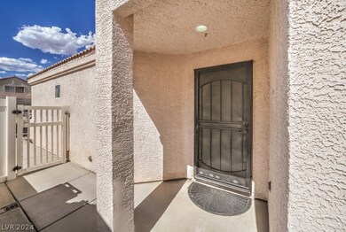 The front door is situated in this quant courtyard