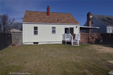 Exterior rear, fenced yard