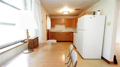 A sun-splashed eat-in kitchen