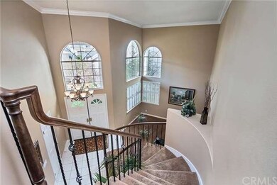 Soaring Cathedral Ceilings and Spiral stairwell wi