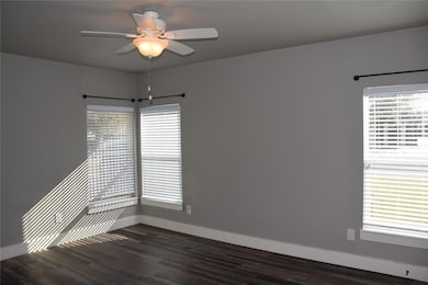 Bedroom with LVP and windows for natural light!