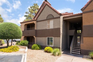 View of property featuring stairway