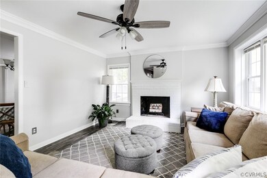 Large living area with tons of natural light and w