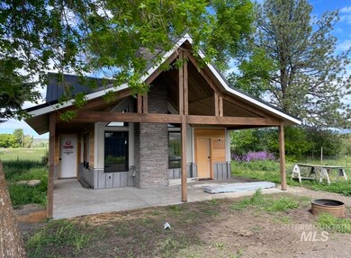 View of front facade with a patio