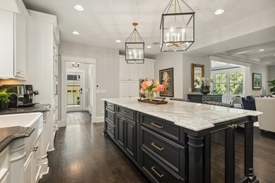 The large center island comfortably seats 4 and ha