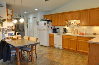 Kitchen featuring sink, decorative light fixtures,
