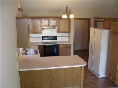 Appliances Remain in Kitchen + Main Floor Laundry