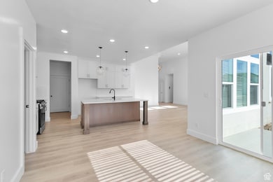 DINING AREA SET OFF FROM KITCHEN W/ LOTS OF WINDOWS! (PICTURE OF PREVIOUS BUILT HOME-OPTIONS, COLORS AND MATERIALS MAY VARY)