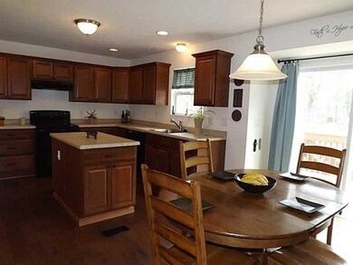 Kitchen. Open eat-in-kitchen to  spacious family r