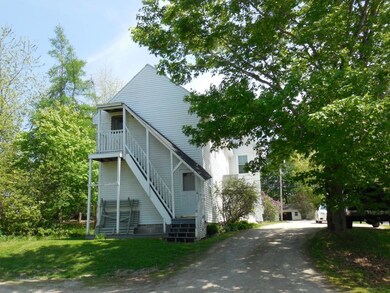 Rear view with entrances to lower...