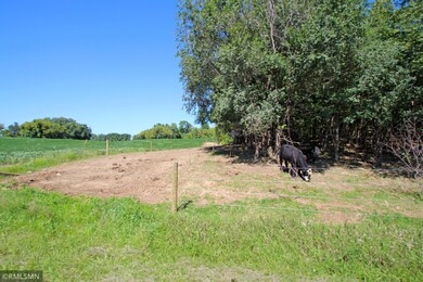 Numerous acres are fenced and ready for grazing. Just outside the city limits of Annandale.