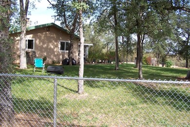 fenced area off of attached 2 car garage