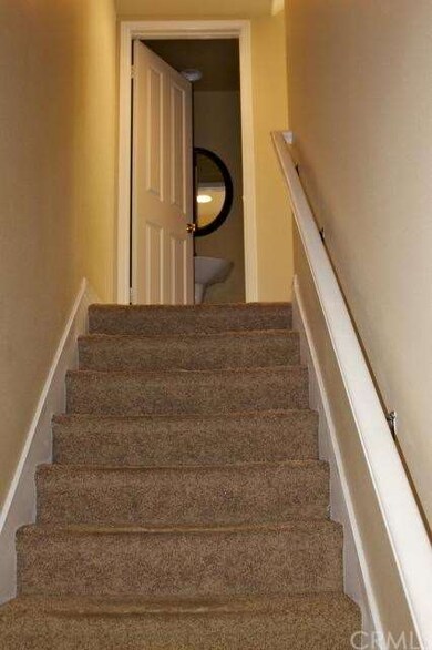 Stairs from garage to living area.