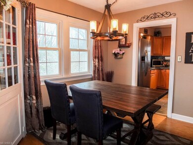 Formal dining room with a built-in corner cabinet.