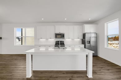 Kitchen *Photo of a previously built home with the same floorplan, finishes/options may vary.