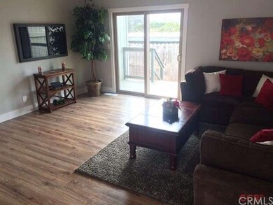 Large family room with wet bar and access to outsi